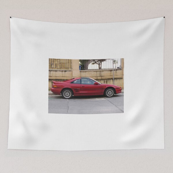 Item preview, Red Sports Coupe Parked On Urban Street Side View With Alloy Wheels And Rear Spoiler designed and sold by Nmallia.