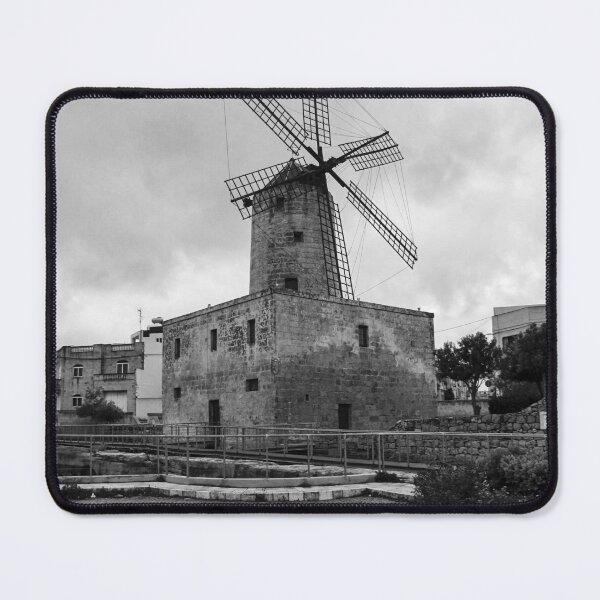 Item preview, Historic Stone Windmill With Large Sails Against Moody Sky in Urban Mediterranean Setting designed and sold by Nmallia.