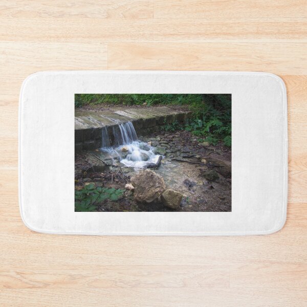 Item preview, Small Woodland Waterfall Cascading Over Stone Ledge With Flowing Stream and Mossy Rocks designed and sold by Nmallia.