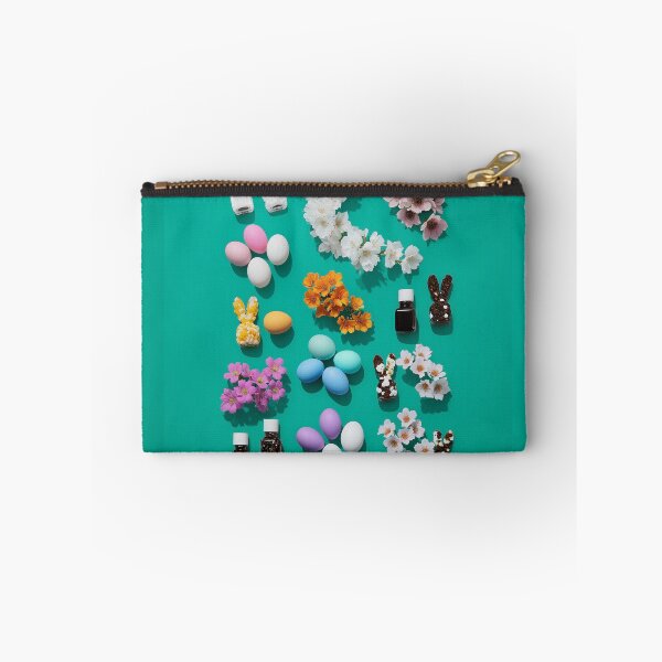Item preview, Colorful Easter decorations with eggs, flowers, and bunny figurines on teal background designed and sold by Stellar Geometry.