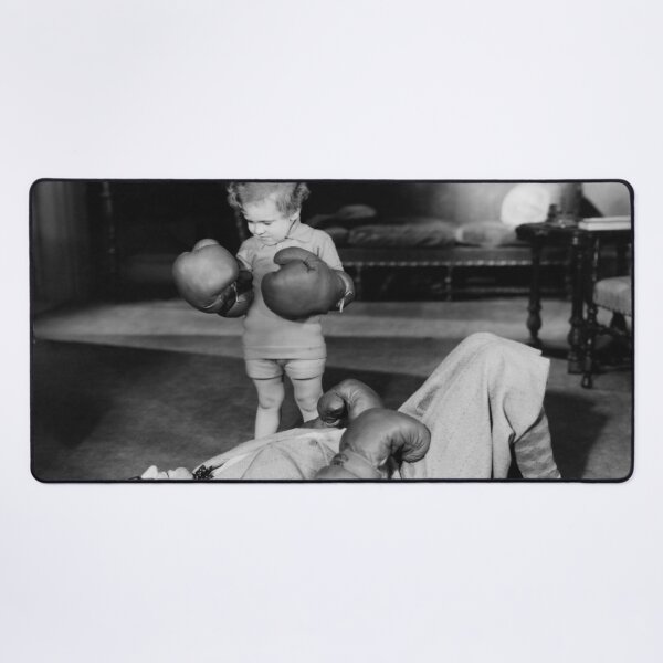 Item preview, TKO, vintage little girl knocks out her father, funny girl power black and white photograph poster art print designed and sold by Astrid Arkhangelsky.