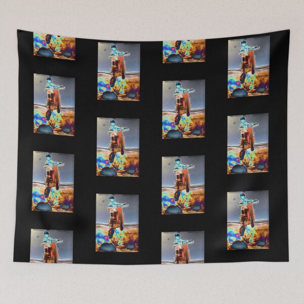 Item preview, Dirtbike rider riding in the desert jumping over rock designed and sold by pixperienz4u.