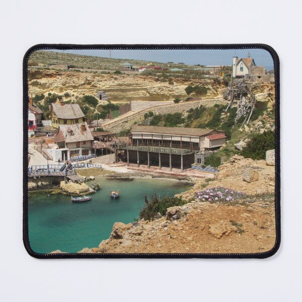Item preview, Colorful Coastal Village On Rocky Cliffs With Small Boats In Calm Turquoise Bay designed and sold by Nmallia.