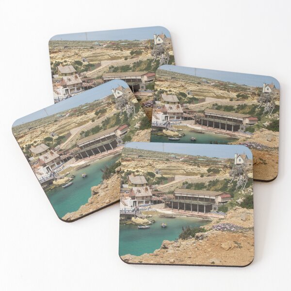Item preview, Colorful Coastal Village On Rocky Cliffs With Small Boats In Calm Turquoise Bay designed and sold by Nmallia.