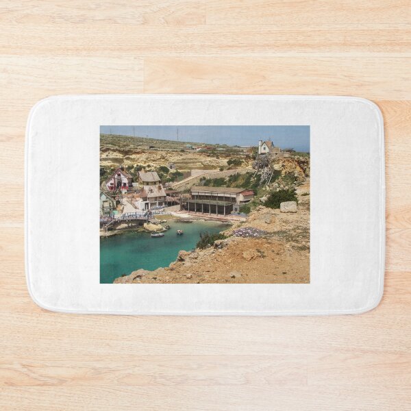 Item preview, Colorful Coastal Village On Rocky Cliffs With Small Boats In Calm Turquoise Bay designed and sold by Nmallia.
