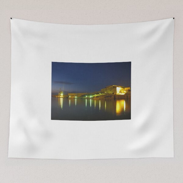 Item preview, Night Harbor With Historic Coastal Fortress, Dock Lights and Reflections on Calm Water designed and sold by Nmallia.