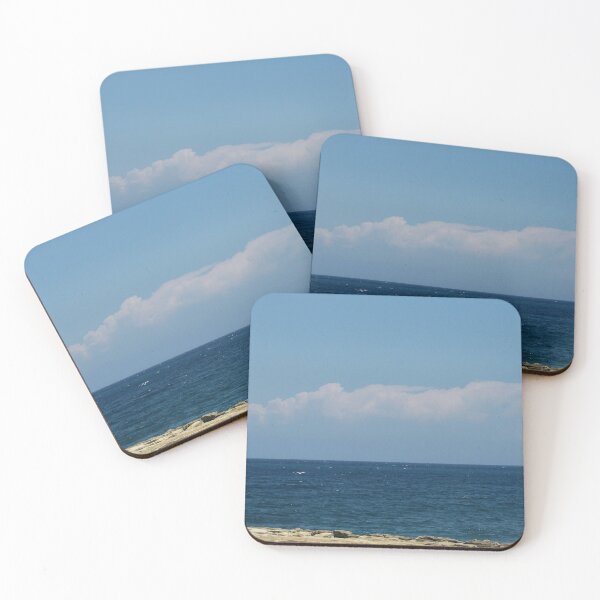 Item preview, Calm Blue Sea and Rocky Shore with Distant Clouds on a Clear Sunny Day designed and sold by Nmallia.