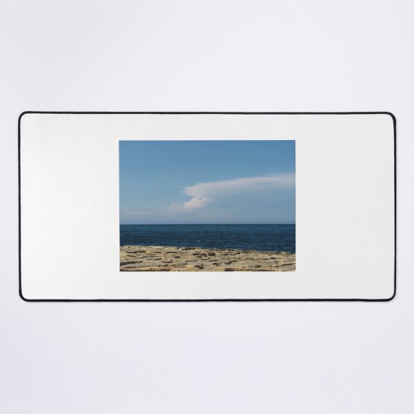 Item preview, Calm Blue Sea and Rocky Shore with Distant Clouds on a Clear Sunny Day designed and sold by Nmallia.