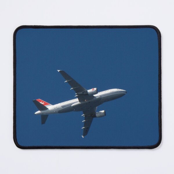 Item preview, Commercial Airplane Flying High Over Clear Blue Sky Viewed From Below In Midair designed and sold by Nmallia.