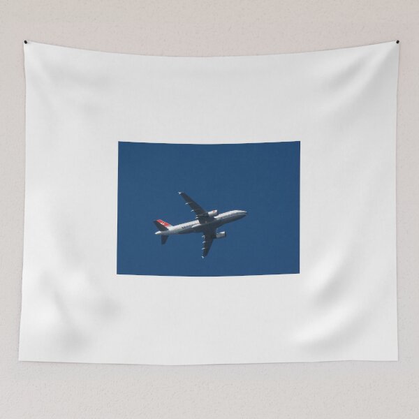 Item preview, Commercial Airplane Flying High Over Clear Blue Sky Viewed From Below In Midair designed and sold by Nmallia.