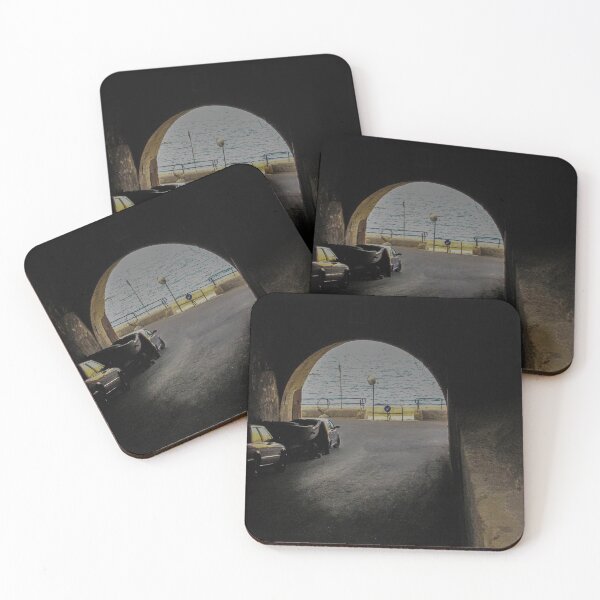 Item preview, View Through Dark Tunnel Archway To Seaside Road With Parked Cars And Calm Sea Horizon designed and sold by Nmallia.