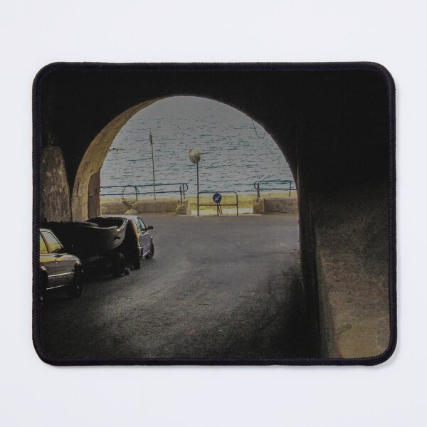 Item preview, View Through Dark Tunnel Archway To Seaside Road With Parked Cars And Calm Sea Horizon designed and sold by Nmallia.