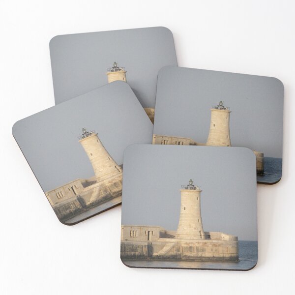 Item preview, Stone Lighthouse on Harbor Breakwater at Sunset Over Calm Sea With Reflection designed and sold by Nmallia.