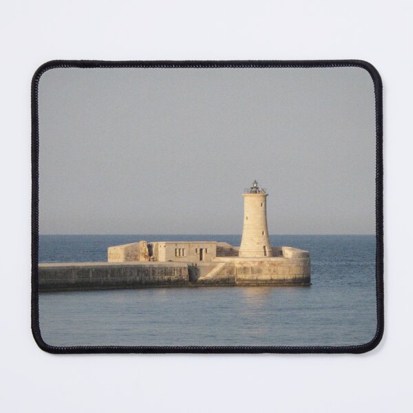 Item preview, Stone Lighthouse on Harbor Breakwater at Sunset Over Calm Sea With Reflection designed and sold by Nmallia.