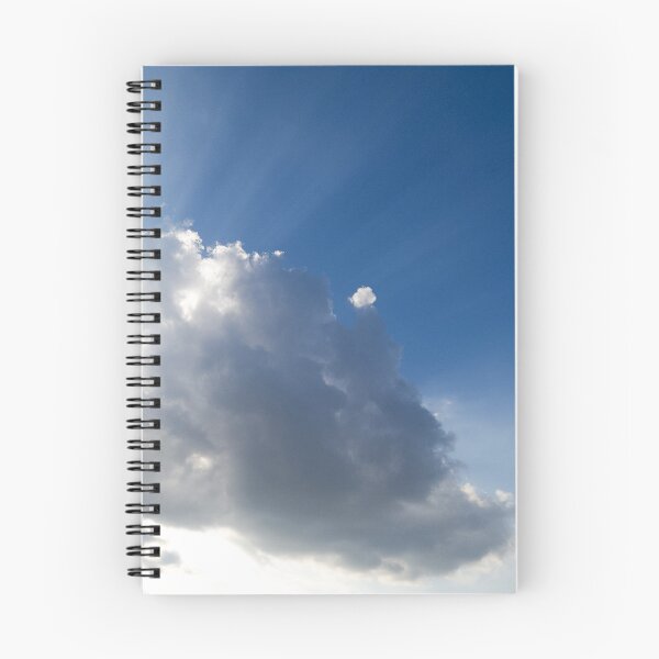 Aperçu de l'œuvre Beaux nuages blancs et rayons de soleil créée et vendue par JAB Photos and Design.