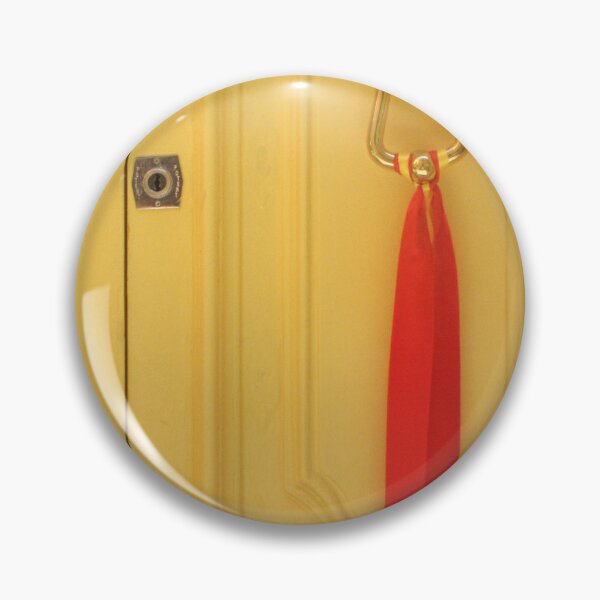 Item preview, Yellow Wooden Door With Brass Knocker And Red Ribbon Decoration On Vintage Entrance designed and sold by Nmallia.