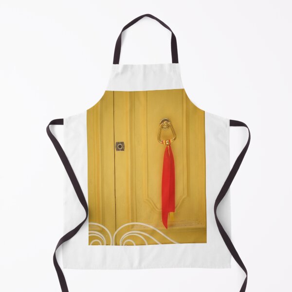 Item preview, Yellow Wooden Door With Brass Knocker And Red Ribbon Decoration On Vintage Entrance designed and sold by Nmallia.