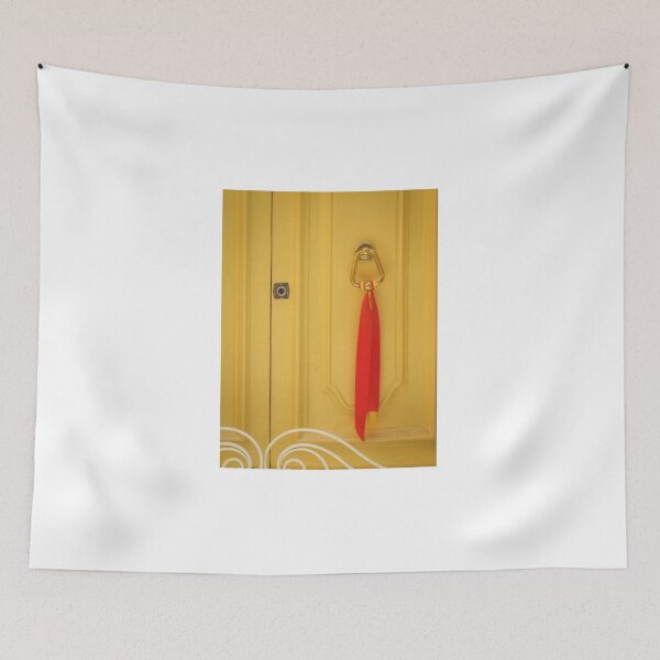 Item preview, Yellow Wooden Door With Brass Knocker And Red Ribbon Decoration On Vintage Entrance designed and sold by Nmallia.