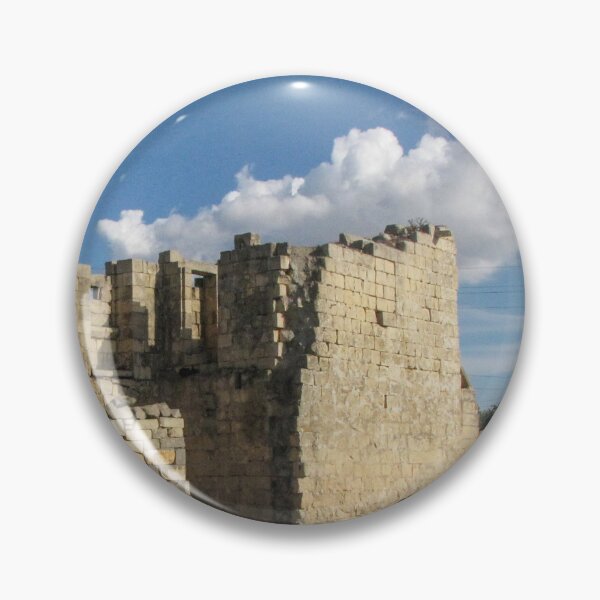 Item preview, Old Stone Ruins With Archway and Rusted Gate Beside Road Under Blue Sky designed and sold by Nmallia.