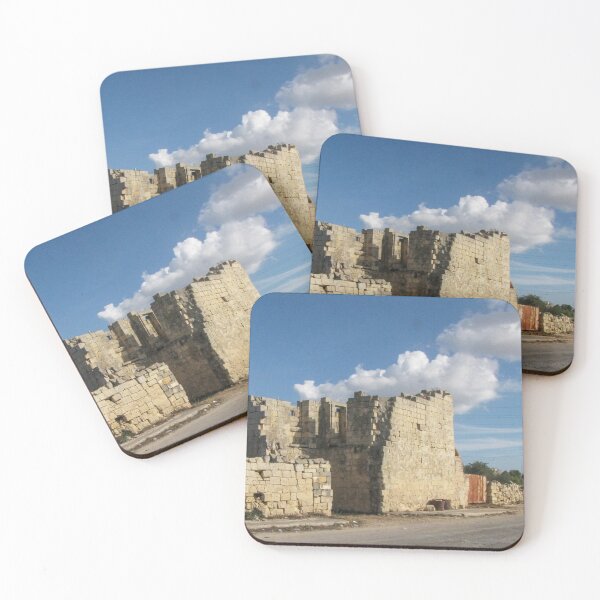 Item preview, Old Stone Ruins With Archway and Rusted Gate Beside Road Under Blue Sky designed and sold by Nmallia.