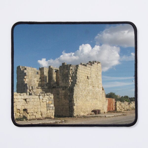Item preview, Old Stone Ruins With Archway and Rusted Gate Beside Road Under Blue Sky designed and sold by Nmallia.