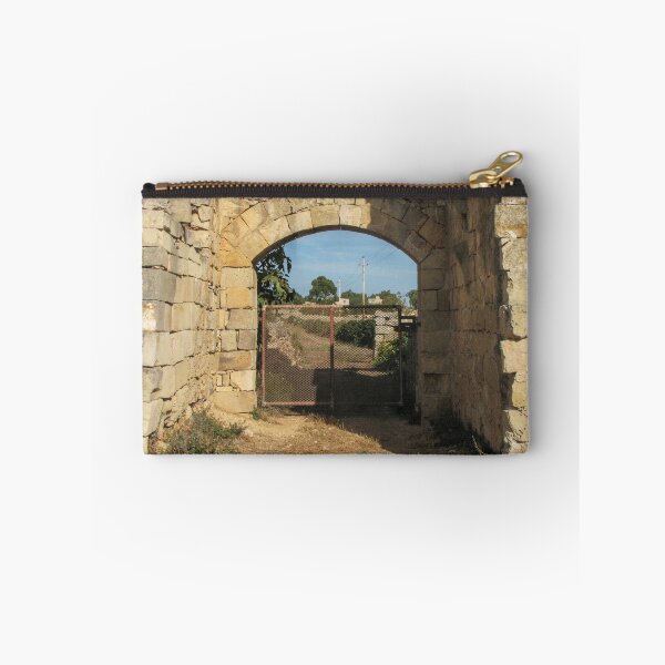Item preview, Old Stone Archway With Rusty Metal Gate Framing a Rural Path and Sunlit Countryside designed and sold by Nmallia.