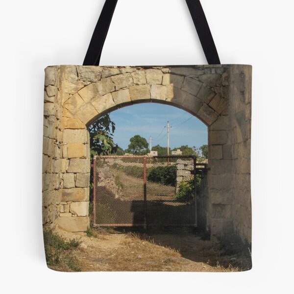 Item preview, Old Stone Archway With Rusty Metal Gate Framing a Rural Path and Sunlit Countryside designed and sold by Nmallia.