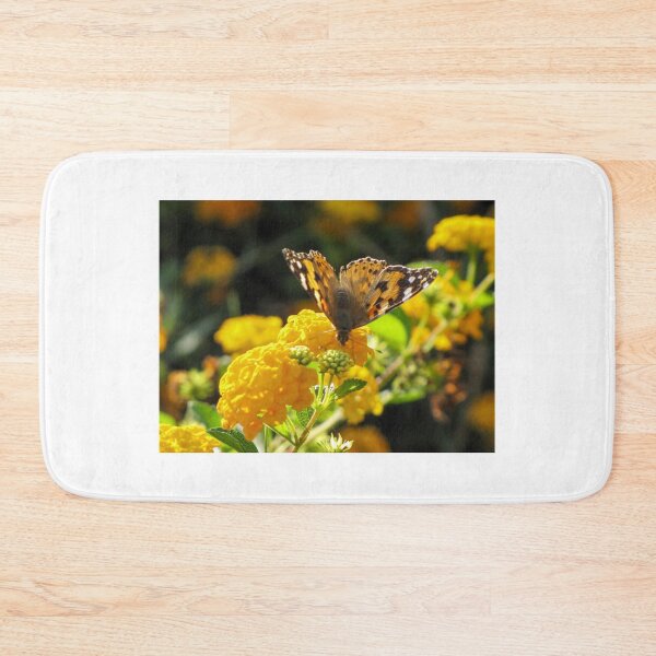 Item preview, Yellow Butterfly Feeding on Vibrant Lantana Flowers in a Sunlit Garden Macro Close-Up  designed and sold by Nmallia.