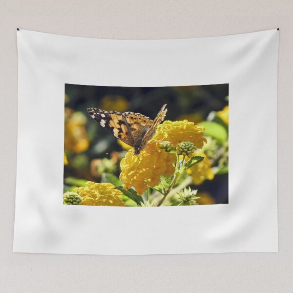 Item preview, Yellow Butterfly Feeding on Vibrant Lantana Flowers in a Sunlit Garden Macro Close-Up  designed and sold by Nmallia.