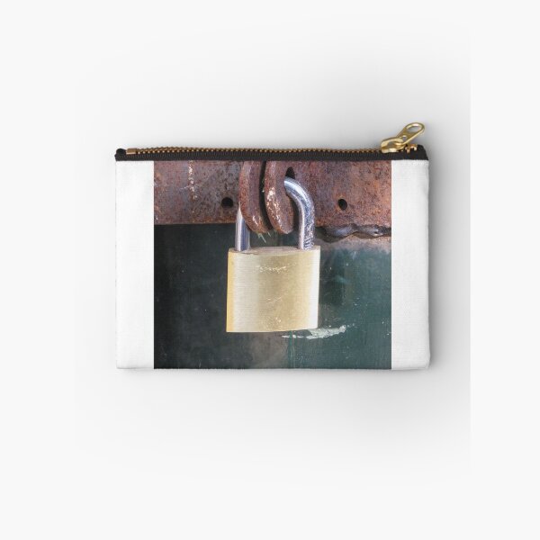 Item preview, Brass Padlock Securing Rusty Metal Hasp on Weathered Green Door, Security and Protection Concept designed and sold by Nmallia.