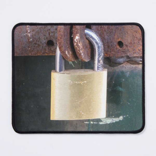 Item preview, Brass Padlock Securing Rusty Metal Hasp on Weathered Green Door, Security and Protection Concept designed and sold by Nmallia.