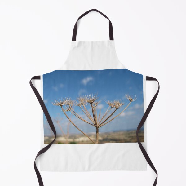 Item preview, Dried Wildflower Seed Head Against Clear Blue Sky Over Coastal Landscape With Soft Bokeh designed and sold by Nmallia.