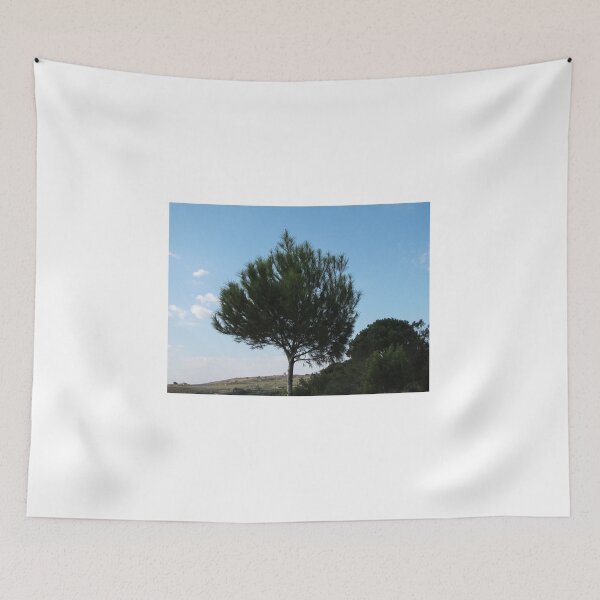 Item preview, Solitary Pine Tree On Rolling Hill With Clear Blue Sky And Countryside View designed and sold by Nmallia.