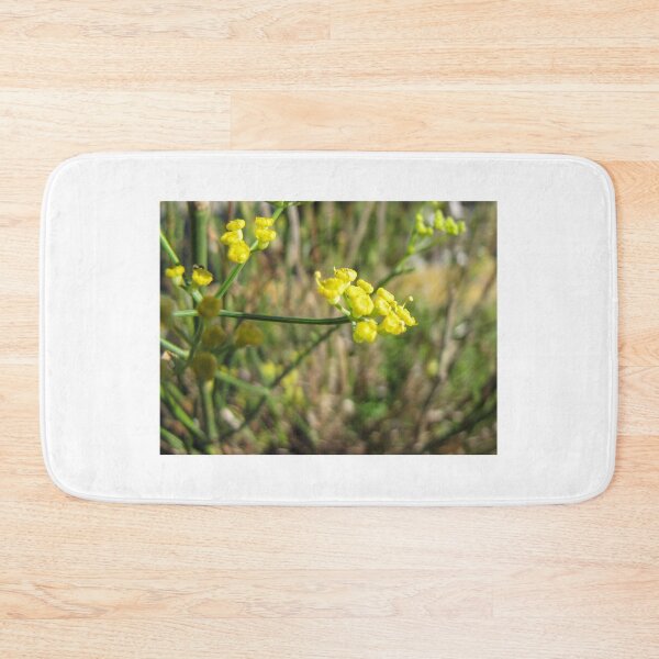 Item preview, Macro Close-Up Of Tiny Yellow Wildflowers With Green Stems And Soft Bokeh Background designed and sold by Nmallia.