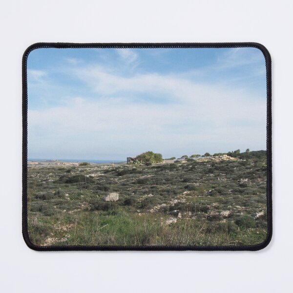 Item preview, Wide Coastal Countryside Landscape With Rocky Field, Distant Sea and Open Blue Sky designed and sold by Nmallia.