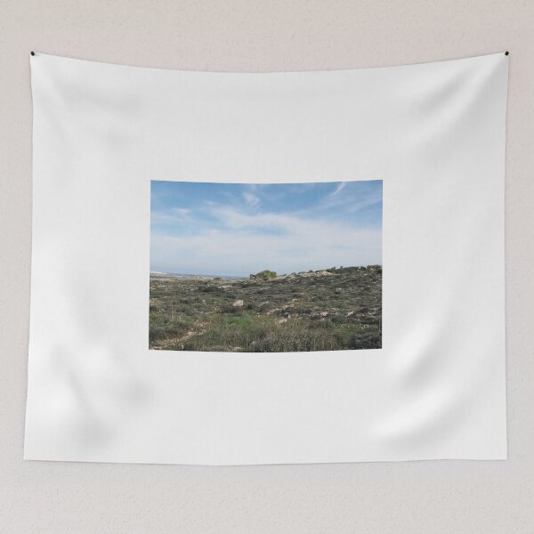 Item preview, Wide Coastal Countryside Landscape With Rocky Field, Distant Sea and Open Blue Sky designed and sold by Nmallia.