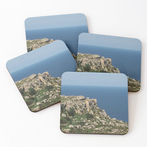 Item preview, Rocky Coastal Cliff Overlooking Calm Blue Sea With Mediterranean Shrubland And Distant Horizon designed and sold by Nmallia.