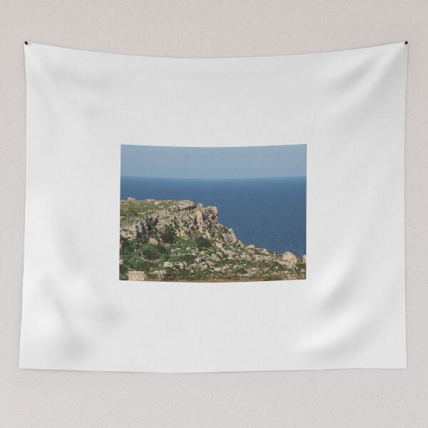 Item preview, Rocky Coastal Cliff Overlooking Calm Blue Sea With Mediterranean Shrubland And Distant Horizon designed and sold by Nmallia.