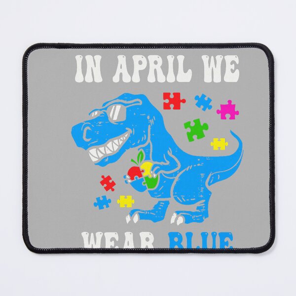 Item preview, in April We Wear Blue Autism Awareness Dino T-Rex Dinosaur designed and sold by GreggRoss.