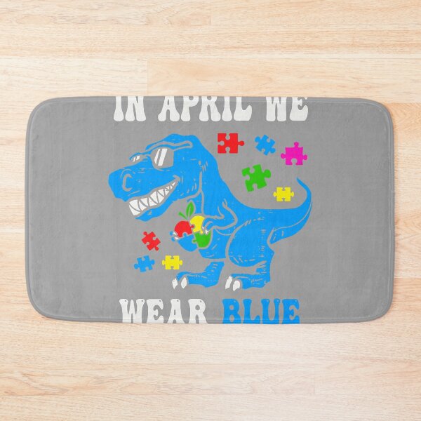 Item preview, in April We Wear Blue Autism Awareness Dino T-Rex Dinosaur designed and sold by GreggRoss.