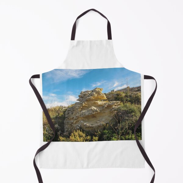 Item preview, Eroded Limestone Rock Formation in Rugged Mediterranean Landscape With Blue Sky and Coastal Vegetation designed and sold by Nmallia.