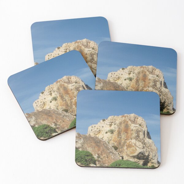 Item preview, Eroded Limestone Rock Formation in Rugged Mediterranean Landscape With Blue Sky and Coastal Vegetation designed and sold by Nmallia.