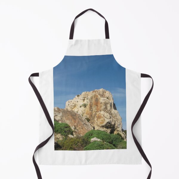 Item preview, Eroded Limestone Rock Formation in Rugged Mediterranean Landscape With Blue Sky and Coastal Vegetation designed and sold by Nmallia.