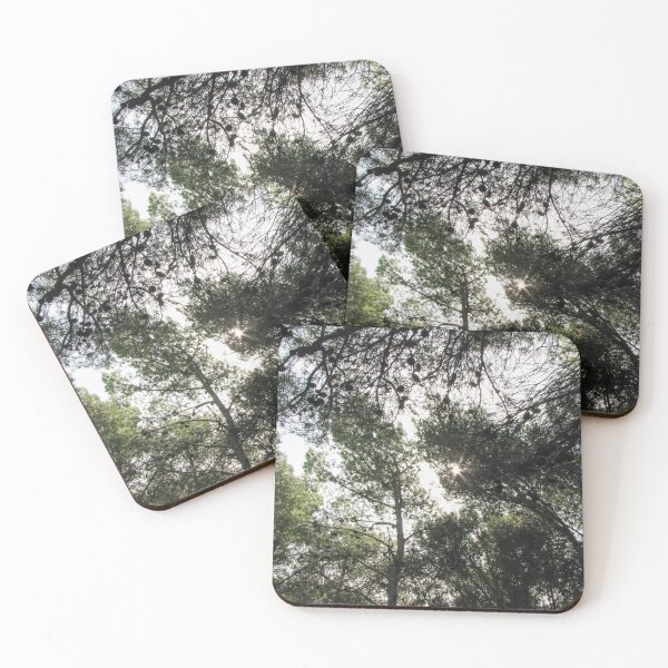 Item preview, Sunlight Filtering Through Pine Trees in a Dense Forest Canopy With Scattered Pine Cones designed and sold by Nmallia.