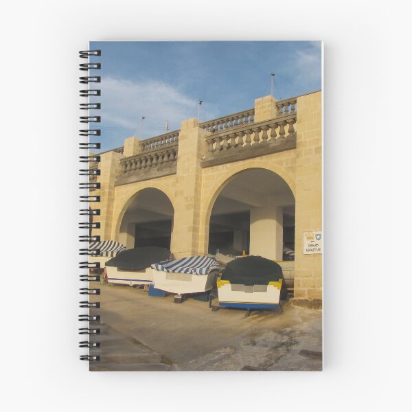 Item preview, Rowboats Stored Under Arched Stone Boathouse With Striped Covers On Sunny Waterfront designed and sold by Nmallia.