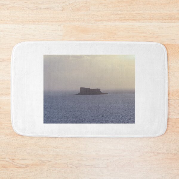 Item preview, Solitary Sea Island at Sunset With Calm Ocean Horizon and Misty Evening Sky designed and sold by Nmallia.