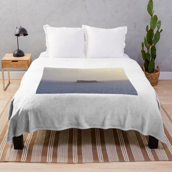 Item preview, Solitary Sea Island at Sunset With Calm Ocean Horizon and Misty Evening Sky designed and sold by Nmallia.