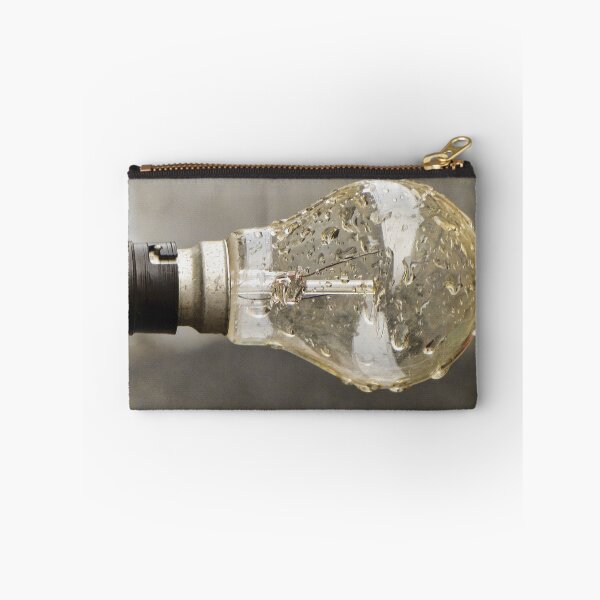 Item preview, Wet Light Bulb Close-Up With Water Droplets On Glass Filament In Vintage Socket designed and sold by Nmallia.