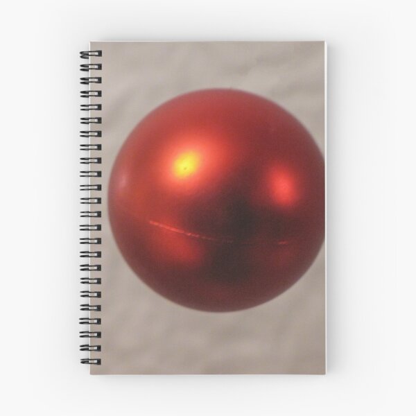 Item preview, Red Christmas Ornament Ball Hanging Against a Soft Neutral Background With Shiny Reflection designed and sold by Nmallia.