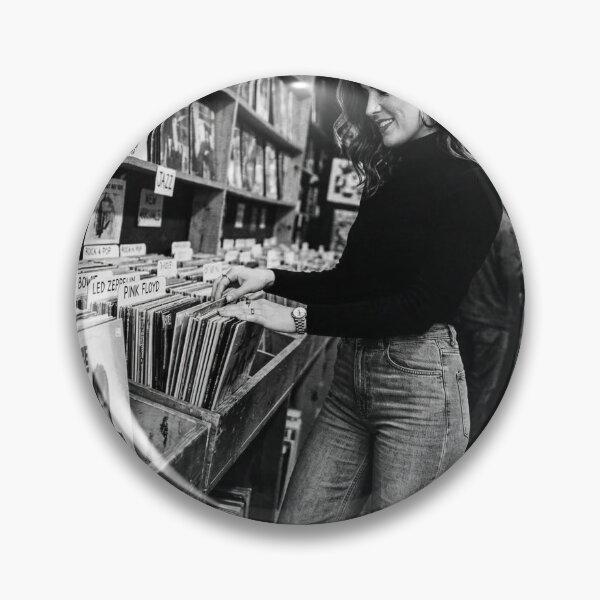 Item preview, Young Woman Browsing Vintage Vinyl Records in Store designed and sold by NiceArtsPlace.